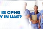 The image features a group of four healthcare professionals dressed in blue medical scrubs, standing in a bright and modern hospital setting. They are smiling and holding medical documents and a tablet. The bold blue text on the left reads, "What is CPHQ Salary in UAE?" The clean and professional design suggests an informative blog about Certified Professional in Healthcare Quality (CPHQ) salaries in the UAE. The website link "https://zabeelinstitute.ae/" directs users to more information on the topic.