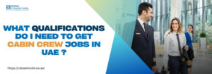 Two smiling airline crew members, a male pilot and a female cabin crew in uniform, walk confidently through a modern airport terminal. On the left, bold text reads: "What qualifications do I need to get cabin crew jobs in UAE?" along with the website link "https://zabeelinstitute.ae/".
