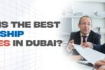 Promotional banner of Zabeel International Institute featuring a professionally dressed man and woman discussing over a laptop. The background shows a modern, grid-like digital design. Bold text reads: 'Where can I find the best professional classes in Dubai for career advancement?' along with the website link https://zabeelinstitute.ae/.