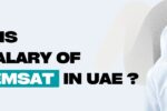 Smiling Emirati man in traditional attire next to bold text asking about MOE EMSAT salary in UAE – Zabeel Institute logo and website link included.