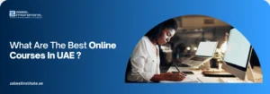 What Are The Best Online Courses In UAE ? A professional woman writing at a desk with dual monitors on a blue Zabeel International Institute banner asking 'What Are The Best Online Courses In UAE?