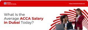 A banner with a dominant white background and a red stripe at the top containing the Zabeel International Institute of Management & Technology logo and the website "https://zabeelinstitute.ae/". The main text on the left asks the question: "What Is the Average ACCA Salary in Dubai Today?". The words "ACCA Salary" and "Dubai" are highlighted in red. The right side features two professional women celebrating a success at a desk with a laptop. One woman in a dark blazer is on a phone, and another woman in a red blazer is smiling and giving her a supportive pat on the shoulder. The background features a red, abstract circular design.