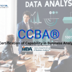 A business meeting focused on data analysis, featuring charts and the CCBA® certification from the International Institute of Business Analysis.